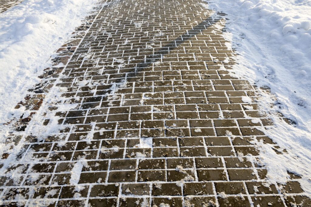 Sidewalk Snow Removal by LandSharx Lawn and Snow