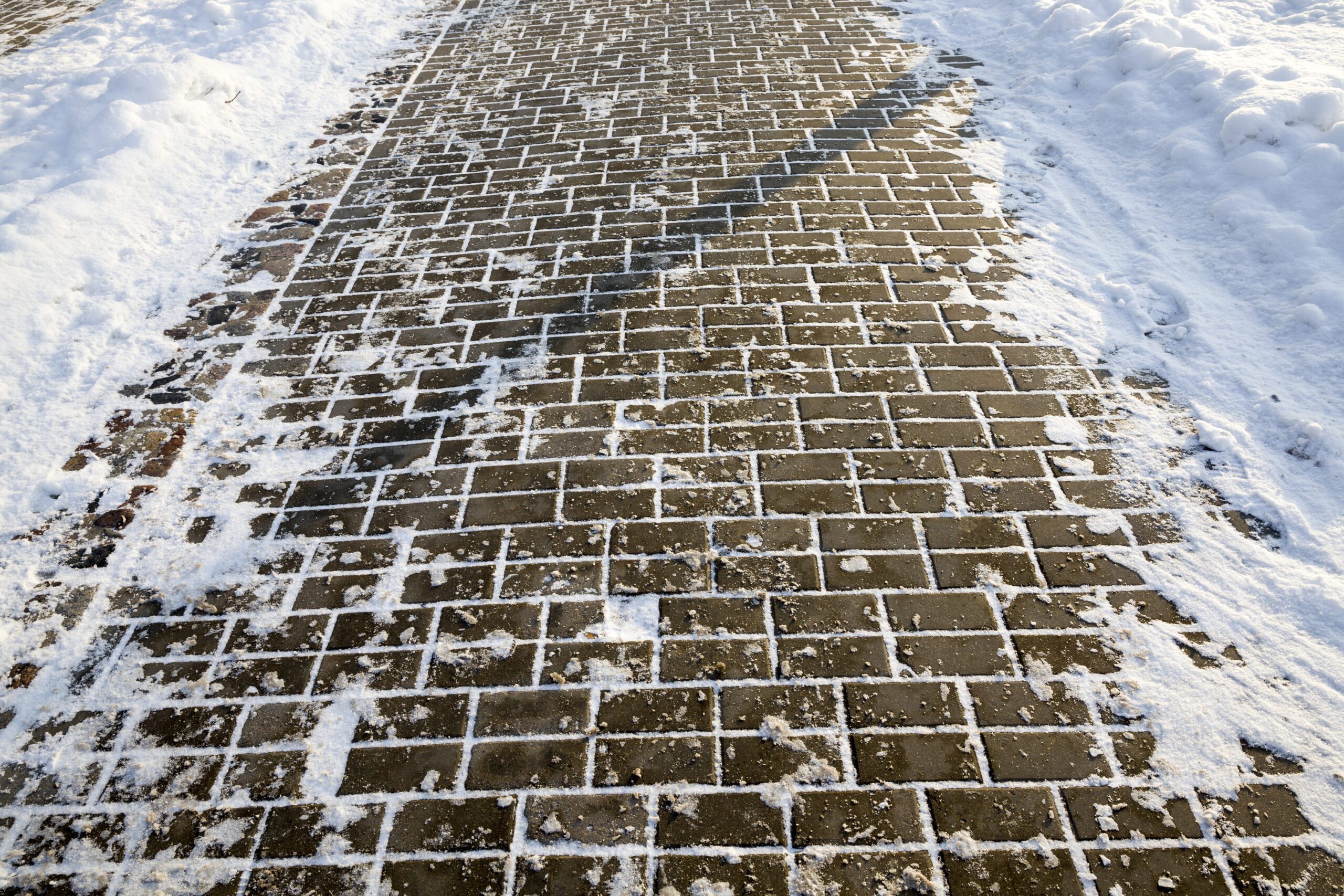 Sidewalk Snow Removal by LandSharx Lawn and Snow