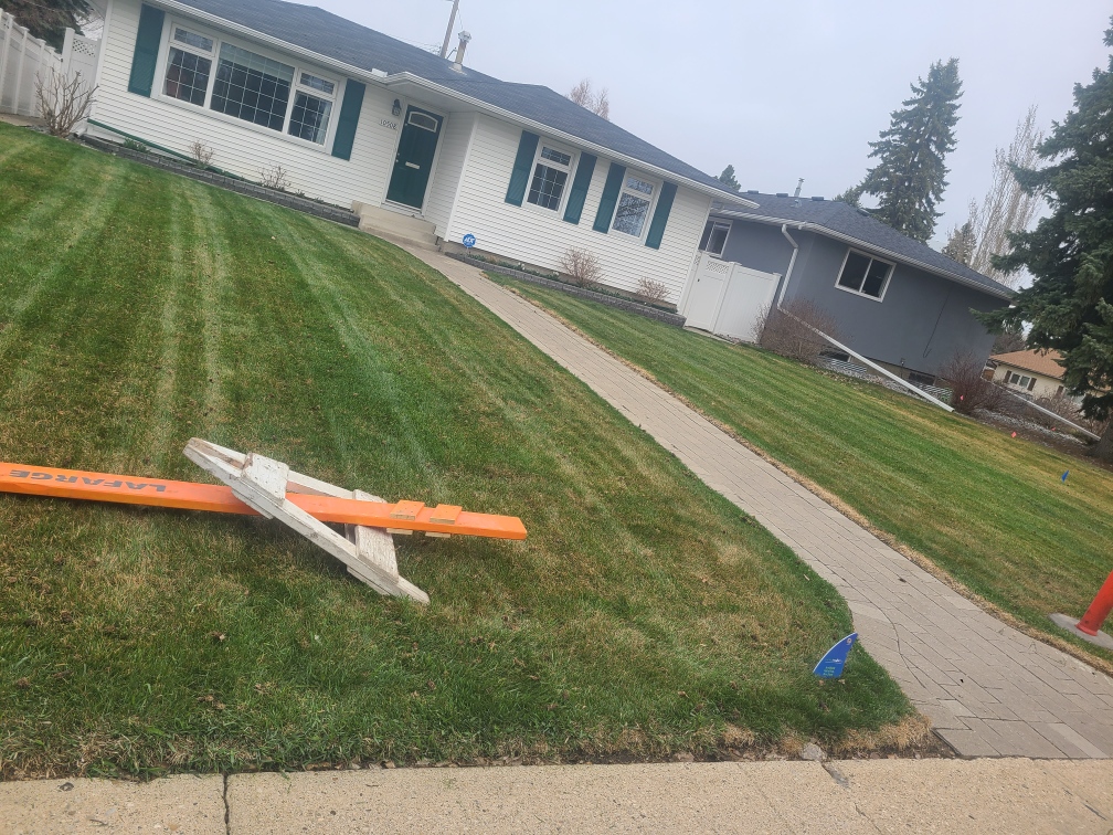 Lawn aeration services in Edmonton and Calgary