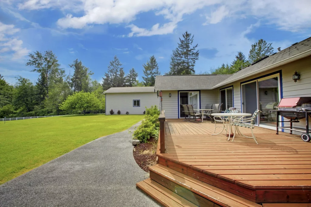 Backyard deck integrated into a landscaped Edmonton residential property